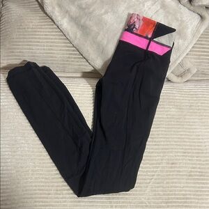 Lululemon Athletica Black Leggings Reversible with Pink Accents